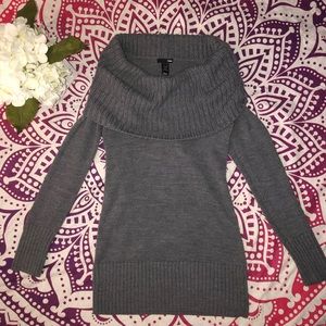 Grey big neck sweater.
